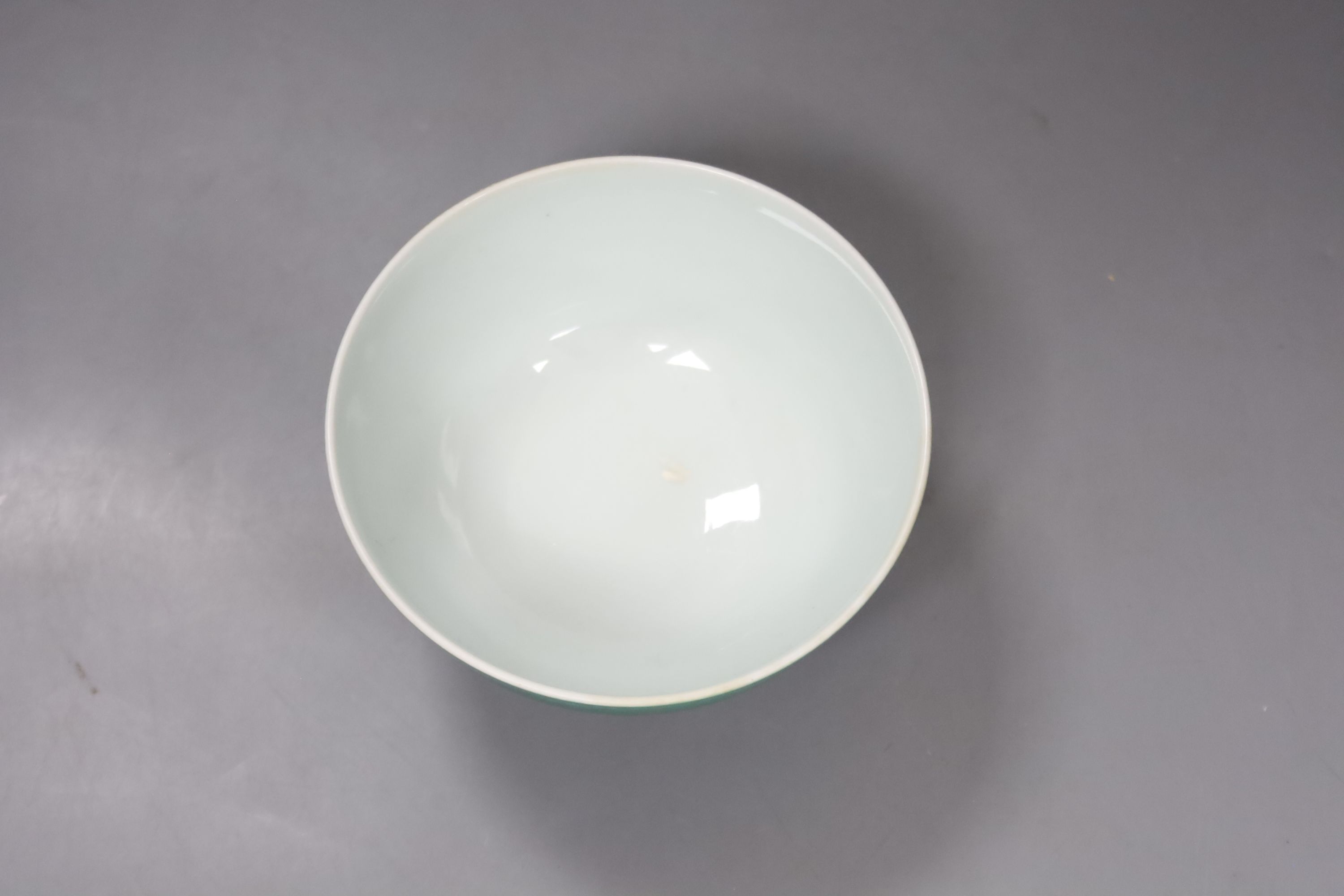 A Chinese green glazed bowl and a Korean celadon vase, height 27cm